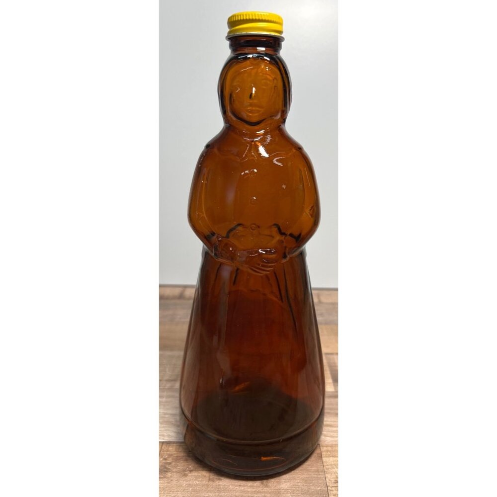 Vintage Brown Glass Amish Woman Bottle With Yellow Screw Cap